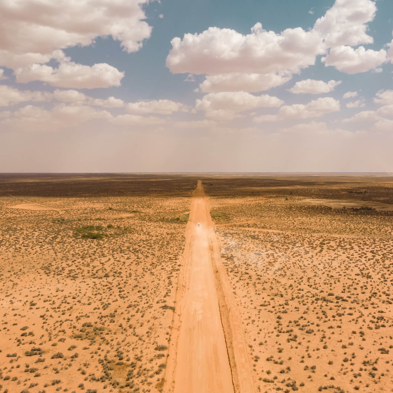 Campervan traveling through the Australian desert